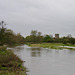 Looking along a swollen River Trent towards Wychnor and the Church of St.Leonard