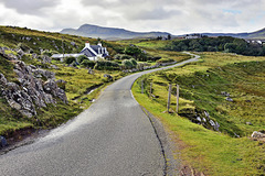 Winding road from The Slipway towards Staffin, Isle of Skye