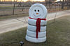 UNUSUAL .... :)   a tire Snowman ! :))  and fences too :))