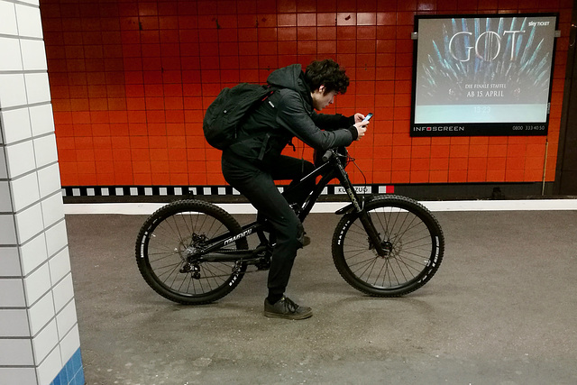 Hamburg 2019 – Cyclist waiting for the U Bahn