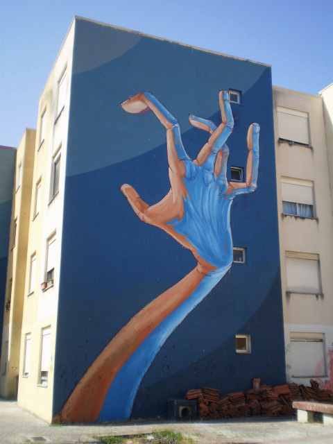 Hand mural, by Utopia.