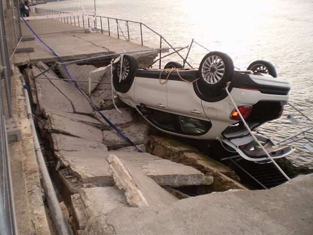 Capsized Fiat on Almada riverside.