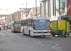 DSCN1334 Eastons H843 UUA and Anglian Bus 403 (AU06 BPF) in Norwich - 15 Feb 2008