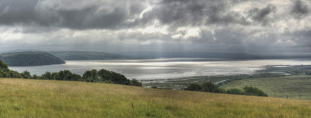 Cloudy start to the day over Carmarthen Bay