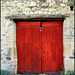 Red door. Canicosa, Segovia Province