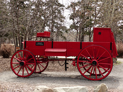 Red wagon by Bow Valley Ranch