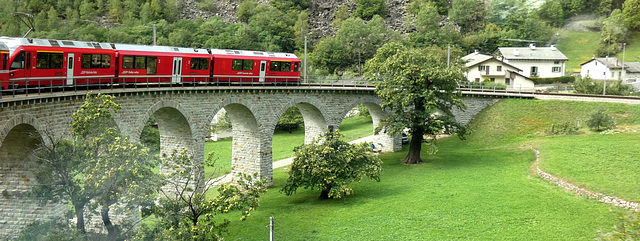 Rhaetian Railway Train on the Brusio Spiral Viaduct