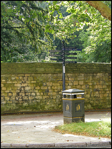 signpost and bin