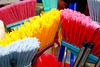 ". . .sweeps with many colored brooms, and leaves the shreds behind. . ."