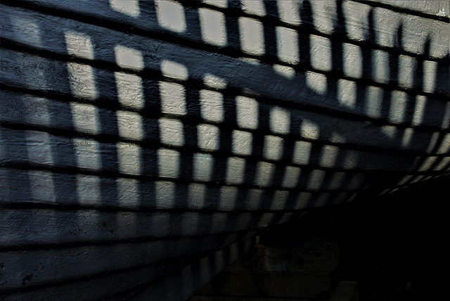 Shadows At The Boat Repair Yard