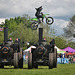 Motorbike jumps two traction engines!