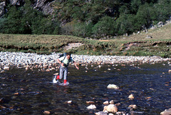 Steve crossing the Waters of Nevis after completing The Ring of Steall 11th May 1993