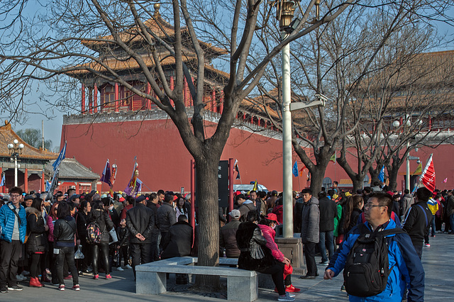 Crowd of tourists enter the Forbidden City