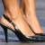 close up of women feet in high heel shoes or high heel sandals.