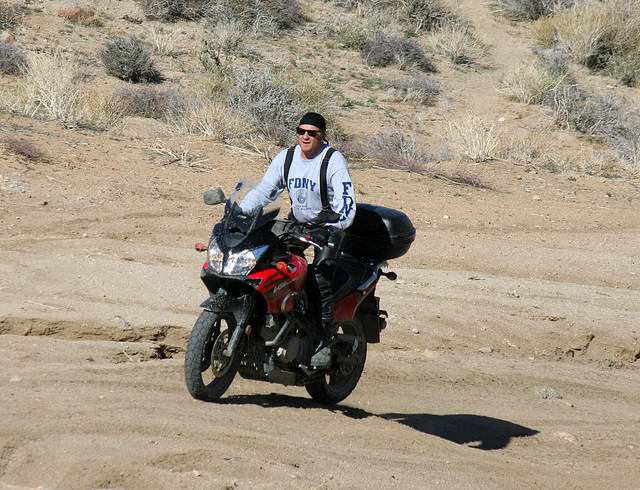 Motorcyclist Climbing Mengel Pass (9710)