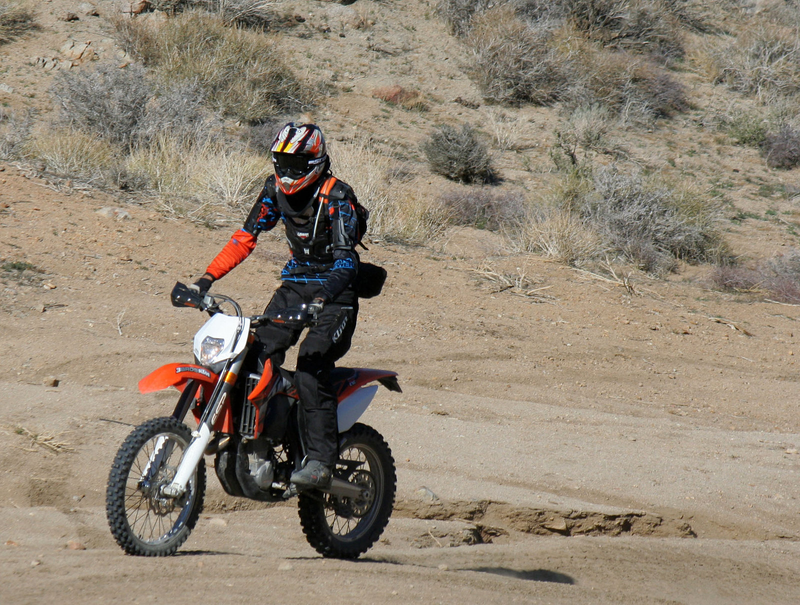 Motorcyclist Climbing Mengel Pass (9700)