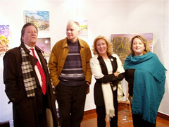 Espaço AmArte, painter Carlos Alexandre (2nd left) with friends