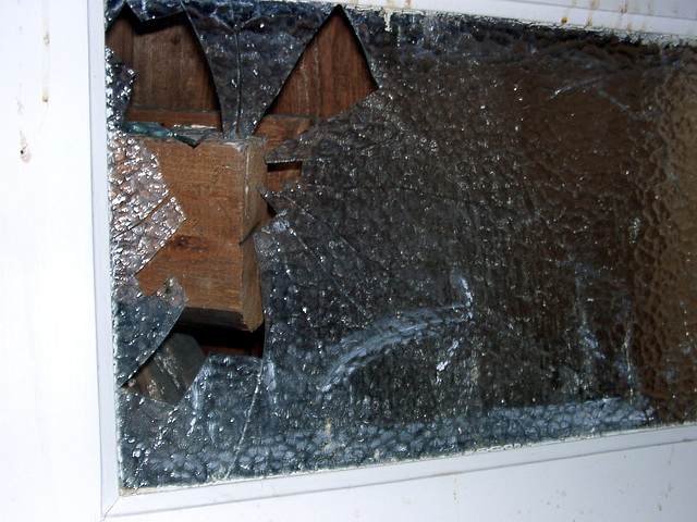 Broken window, by a craftsman