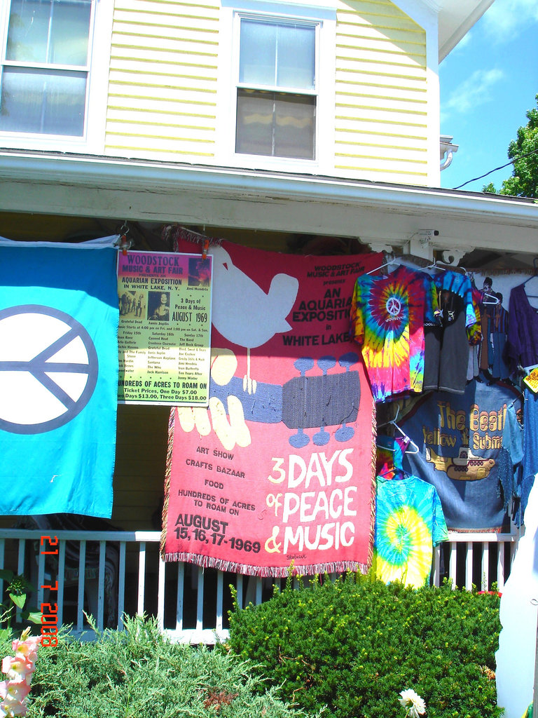 Colourful T-shirts display & concert advertising