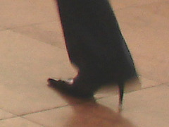 Air Italia black Lady in stiletto boots - Brussels airport /  19-10-2008