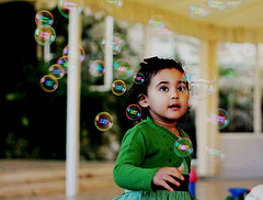 Rafaela, playing with soap bubbles