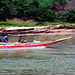 Noisy long-tail-boats running upwards the Mekong