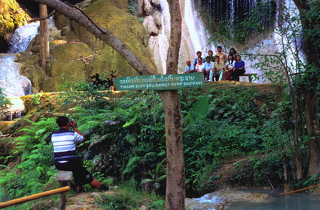 Group photo in front of the Kuang Si Falls