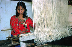 My wife is weaving Laotian garment