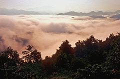 The morning mist is lifting in Laotian mountains
