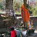 Obeisance to Buddha before entering Wat Phou