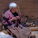 Old nun spins her mala