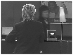 Brussels airlines open blond worker in sexy boots   /   Blonde bien bottée au travail-  Brussels airport - 19-10-2008 - Blanc et noir.