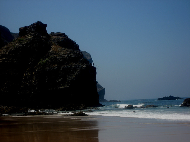 Algarve, Praia Arrifana, fishing from the cliff