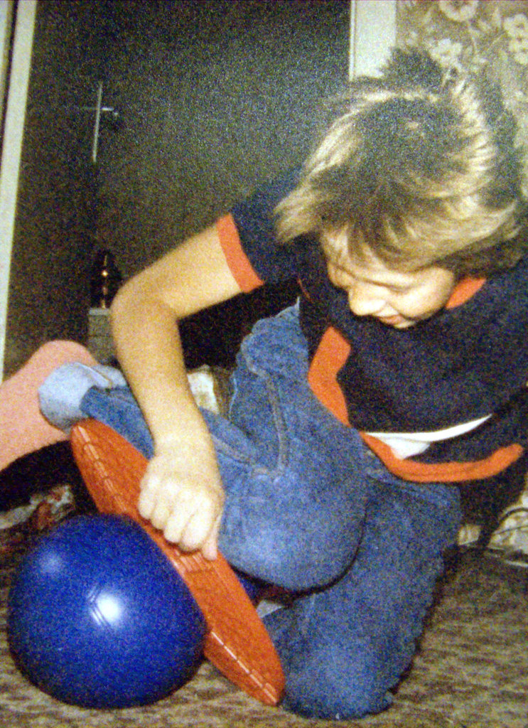 Me playing with a jumpingball at my birthday.