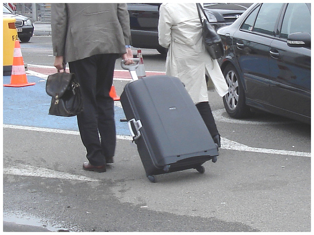 Heras blond mature in extreme hammer heeled boots-  Brussels airport -19-10-2008