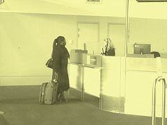 Ponytail Black Lady in wedges -  Brussels airport  / October 19th 2008 - Photofiltrée à l'ancienne.