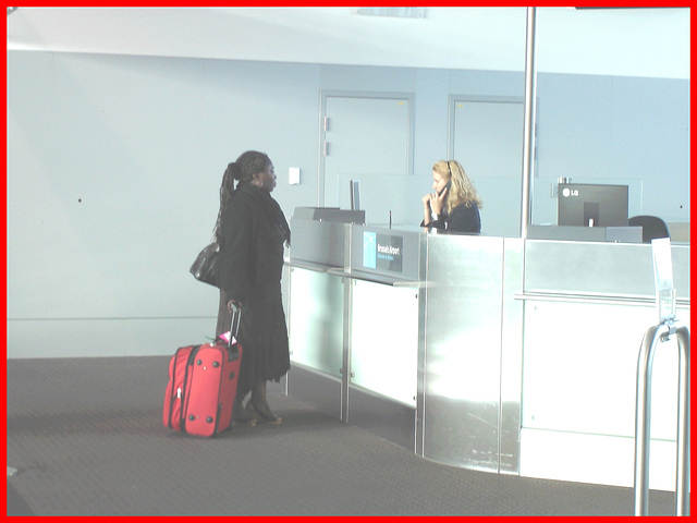 Ponytail Black Lady in wedges -  Brussels airport  / October 19th 2008