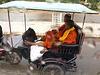 Buddhist Monks in a Tuk Tuk