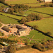 Aerial - Bentley's farmhouse (?), from 1029 feet above Whitley Village Hall, looking east