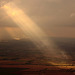 Aerial - Sunbeam breaking through the cloud cover on approach to Southend