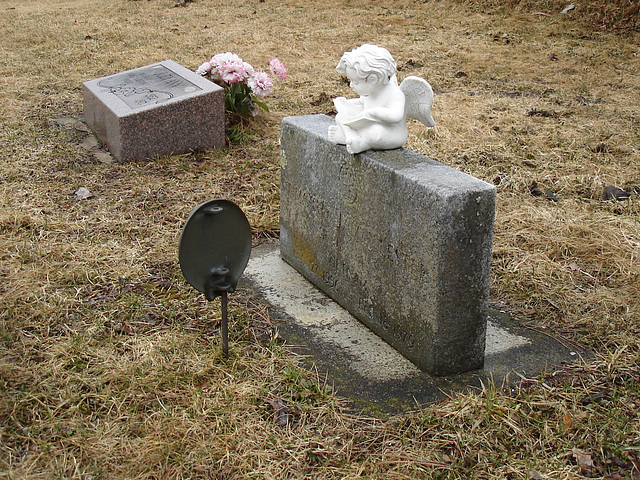 Mountain view cemetery. Saranac lake area.  NY. USA . March 29th 2009