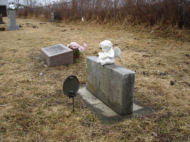 Mountain view cemetery. Saranac lake area.  NY. USA . March 29th 2009