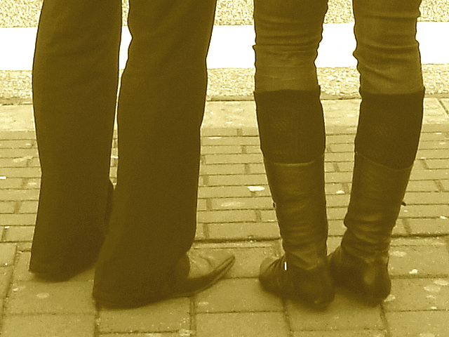 7-eleven booted Lady in sexy jeans - Helsingborg - Sweden.  October 22th 2008  Sepia