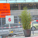 Tall Lady 6 in hammer heeled boots scenery -  Brussels airport   /  19-10-2008- Plante aéroportuaire