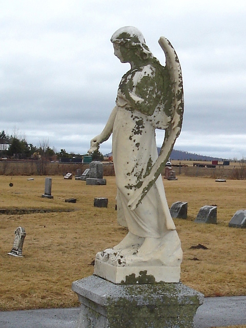 Mountain view cemetery. Saranac lake area.  NY. USA . March 29th 2009