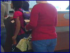 Chubby blond in red and jeans on flats - Blonde mature en souliers plats - PET Montreal airport.