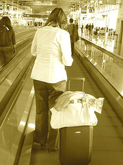 White blouse Lady in stiletto heels - Brussels airport /  19-10-2008  - Sepia