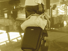 White blouse Lady in stiletto heels - Brussels airport /  19-10-2008- Sepia