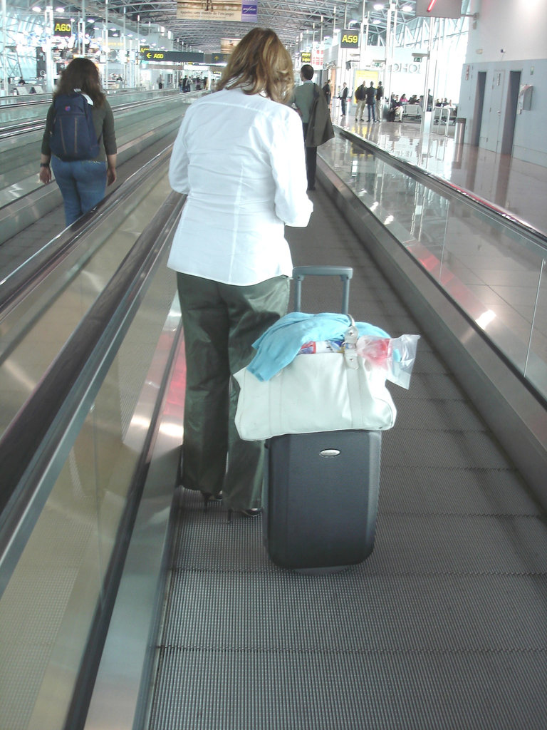 White blouse Lady in stiletto heels - Brussels airport /  19-10-2008