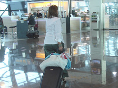 White blouse Lady in stiletto heels - Brussels airport /  19-10-2008